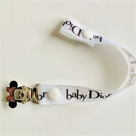 attache tetine baby dior|baby dior products.